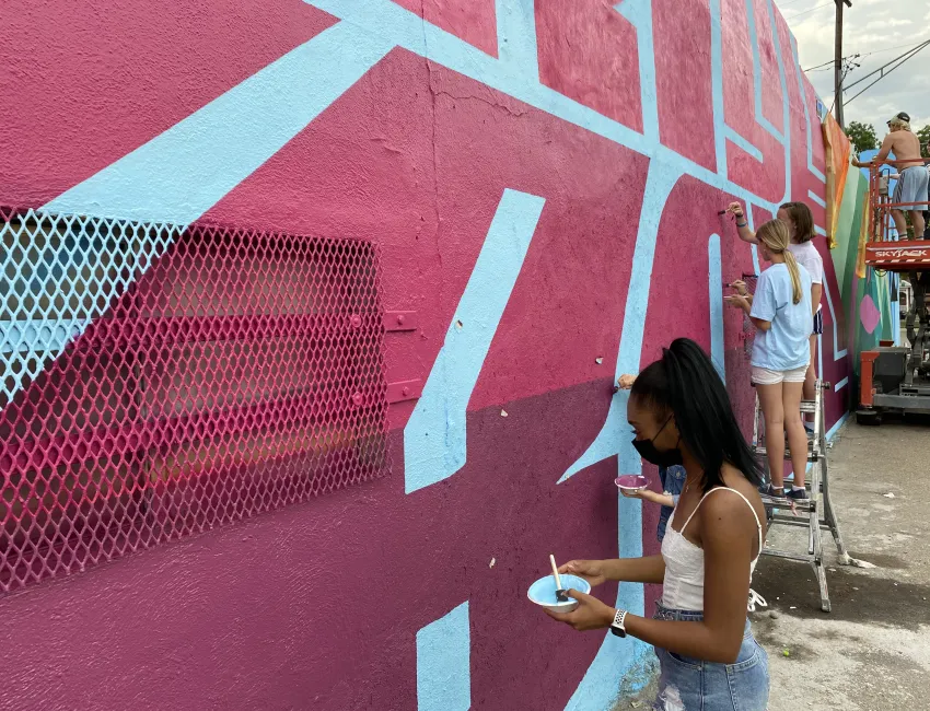 Painting the 50th mural